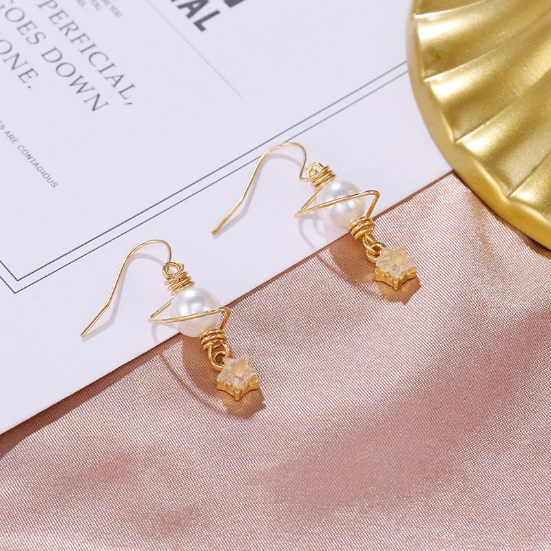 South Korea's New Five-pointed Star Tassel Asymmetric Earrings Temperament Pearl Long Ear Hook Wholesale Nihaojewelry display picture 3