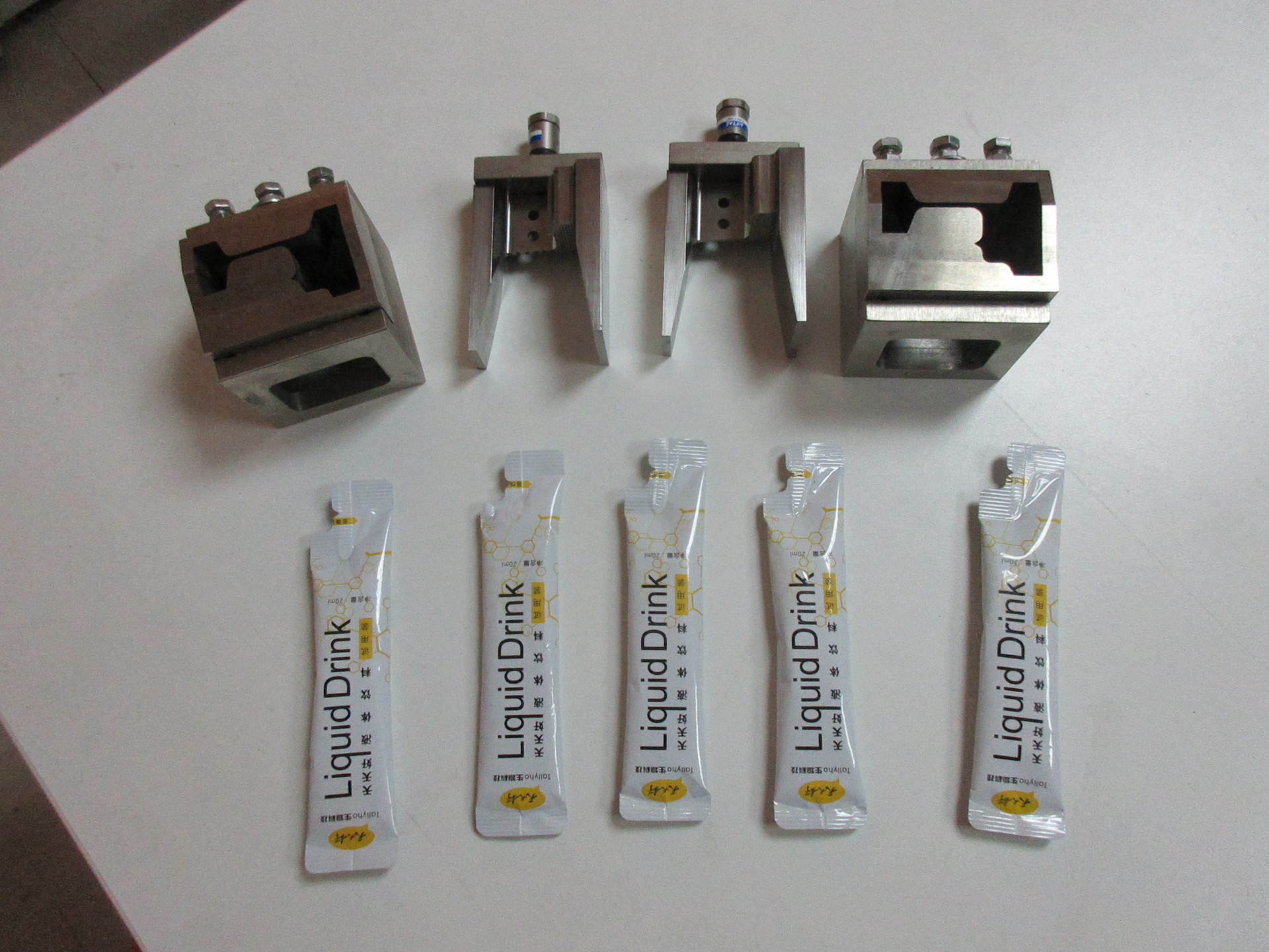 广东玖安模具供应30mm袋宽自动包装机切角模具