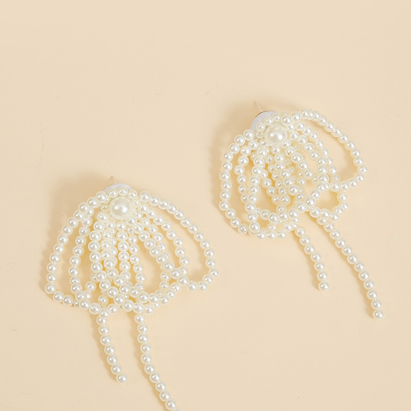 Korean Temperament Hand-woven Pearl Tassel Earrings Personality Long Earrings Jewelry Wholesale Nihaojewelry display picture 6