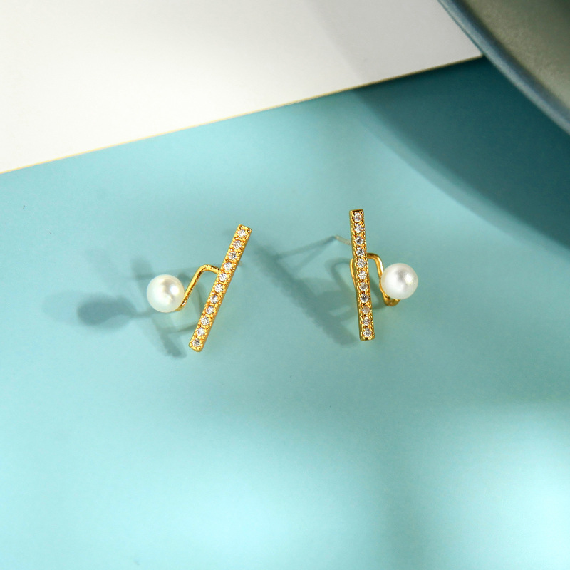 Korean Fashion Copper Zircon Diamond Earrings Niche Pearl Earrings Wind Creative Letter Earrings Wholesale display picture 5