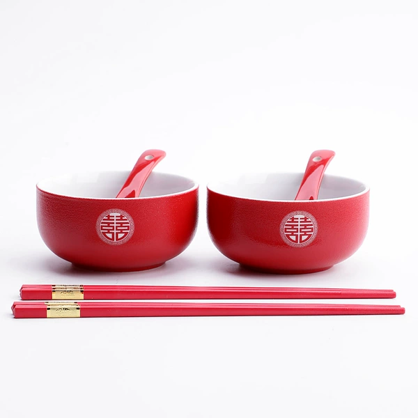 A pair of bowls and chopsticks for newlyweds, a pair made in heaven and a pair of spoons (frosted)
