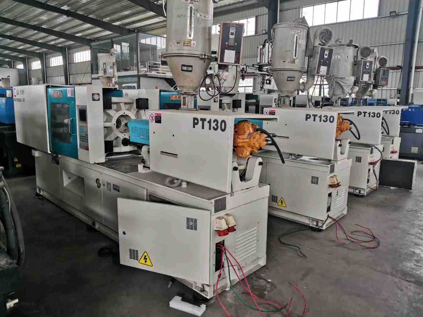 转让出售九成新力劲130三台250多台伺服卧式注塑机