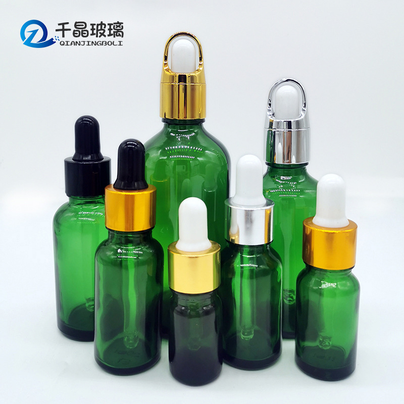 Botella de aceite esencial verde al por mayor 10ml botella de gotero de cabeza de plástico 30ml subbotella de vidrio cosmética 50ml logotipo imprimible