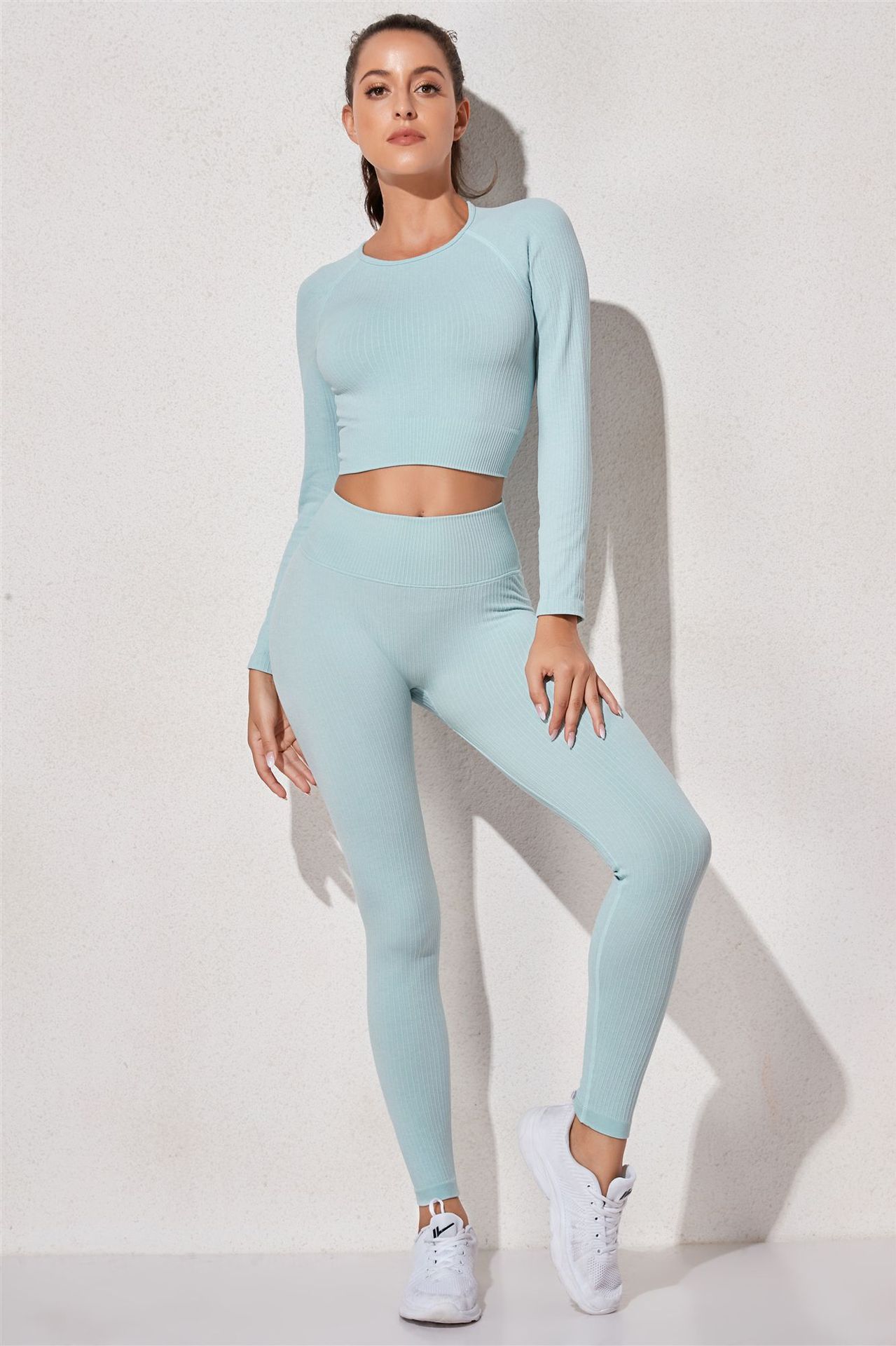 women s sports vest and long sleeve top and tight-fitting leggings yoga three-piece suit nihaostyles wholesale clothing NSXER80563