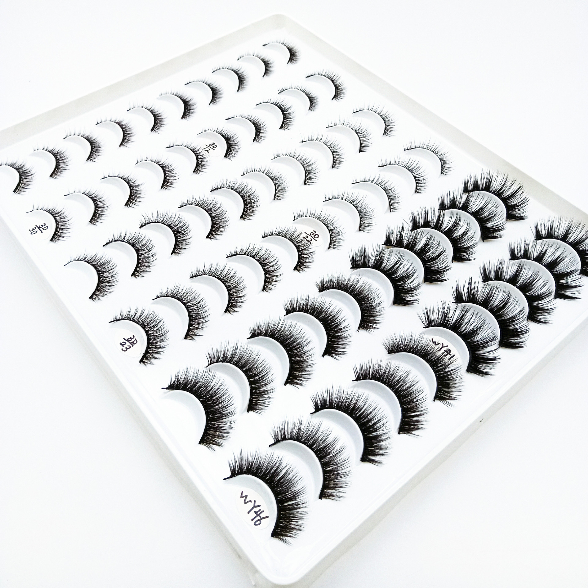 Venta al por mayor de fábrica tridimensional Cruz multi-capa de pestañas ojos grandes europeos y americanos 30 pares mezclados rizado pestañas postizas