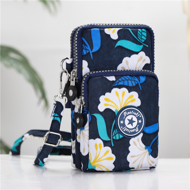 Suministro directo de fábrica BOLSA DE TELÉFONO MÓVIL bolsa de mensajero femenina bolsa de teléfono móvil de pantalla grande monedero bolso de la muñeca Halter corriendo vertical mini