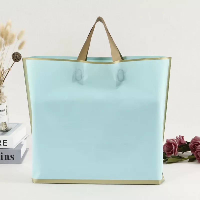 Espesado esmerilado EVA borde dorado embalaje portátil bolsa de plástico cosméticos regalo personalizado bolsa de ropa de compras envío gratuito