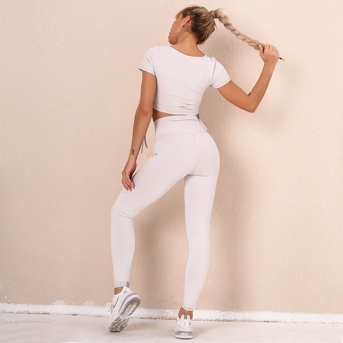 solid color stitching bow sling yoga suit NSNS14719