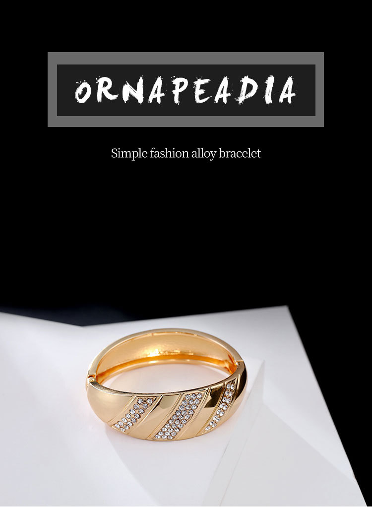 curved smooth diamond gold-plated spring bracelet
