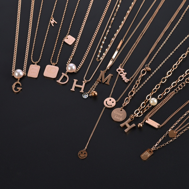 Niche design clavicle chain versatile simple temperament sweater chain titanium steel tassel autumn and winter mid-length necklace women