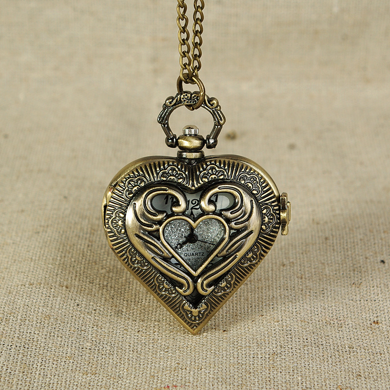 A generation of vintage heart hollow pattern pocket watch bronze heart carving Hollow classical pocket watch 6093