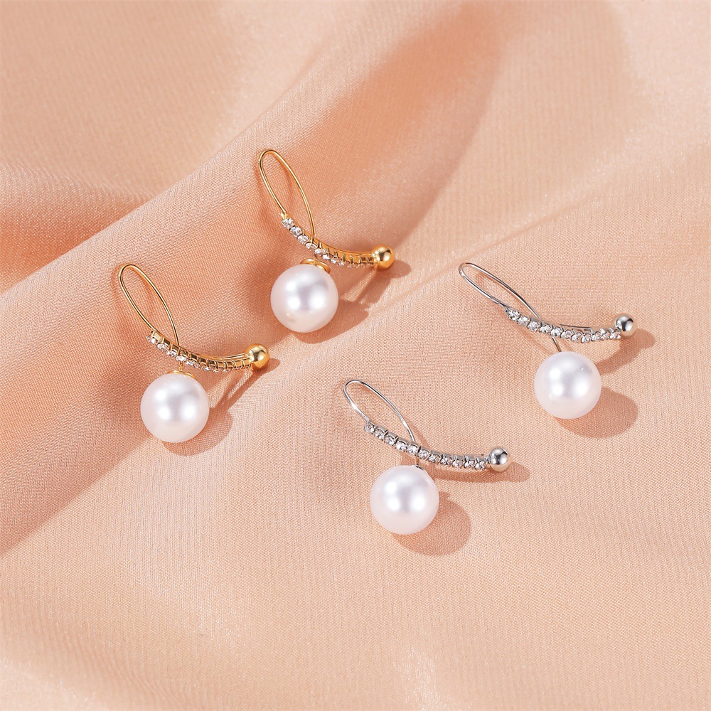New Ear Clip Earrings Temperament Pearl Cross Earrings Ladies Sweet Wild Diamond Inlaid Earring Wholesale Nihaojewelry display picture 5