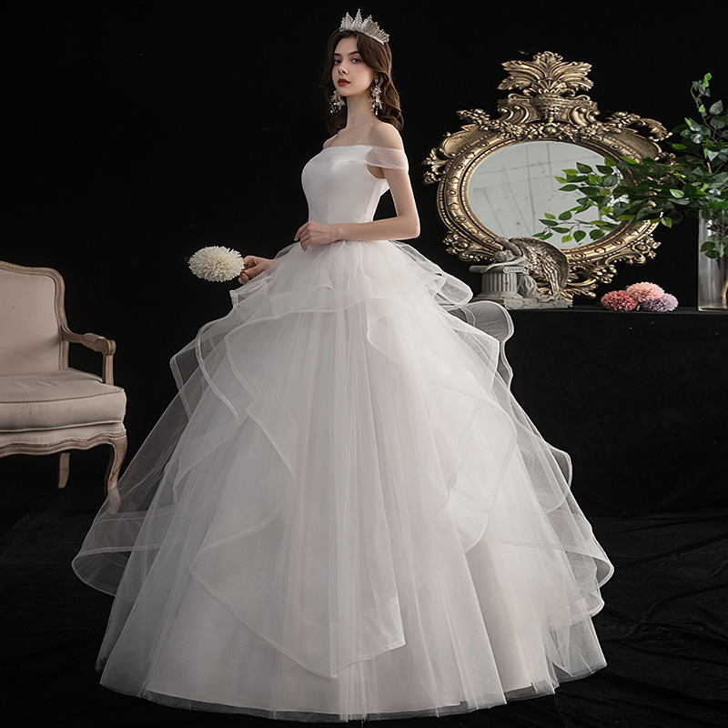 Vestido de novia estilo 2026 con diseño de hombros descubiertos, efecto adelgazante, largo hasta el suelo, estilo sencillo para mujeres pequeñas, vestido de novia ligero estilo francés para salir. image 1