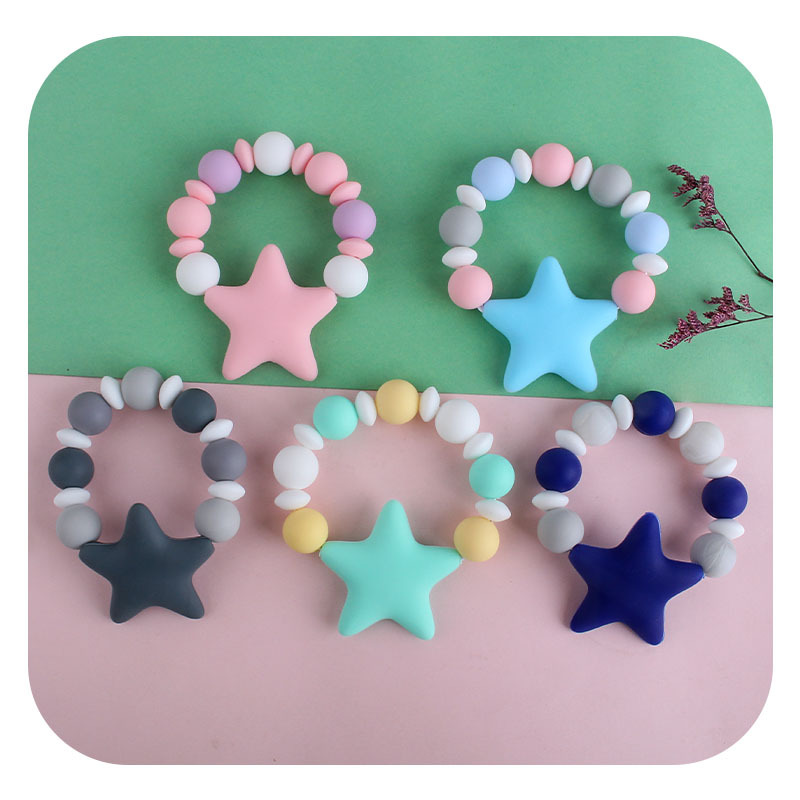 Bebé clip de chupete de plástico bebé calmante de silicona estrella de cinco puntas pulsera molar chupete cadena Amazon nuevo