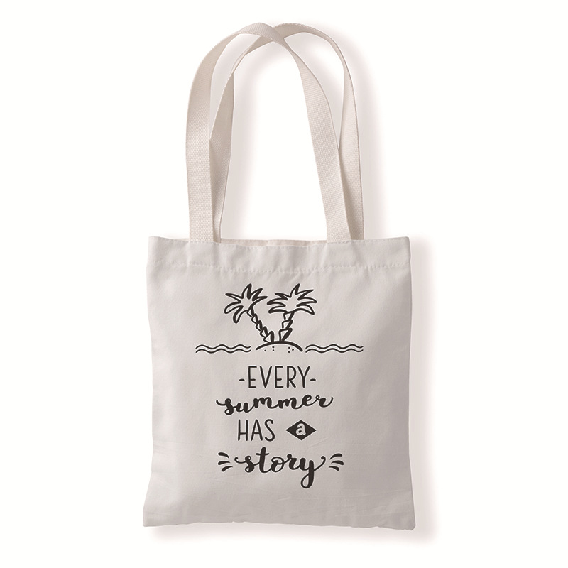 几何字母创意图案帆布材质袋单肩学生小手拎包零钱袋休闲百搭女包