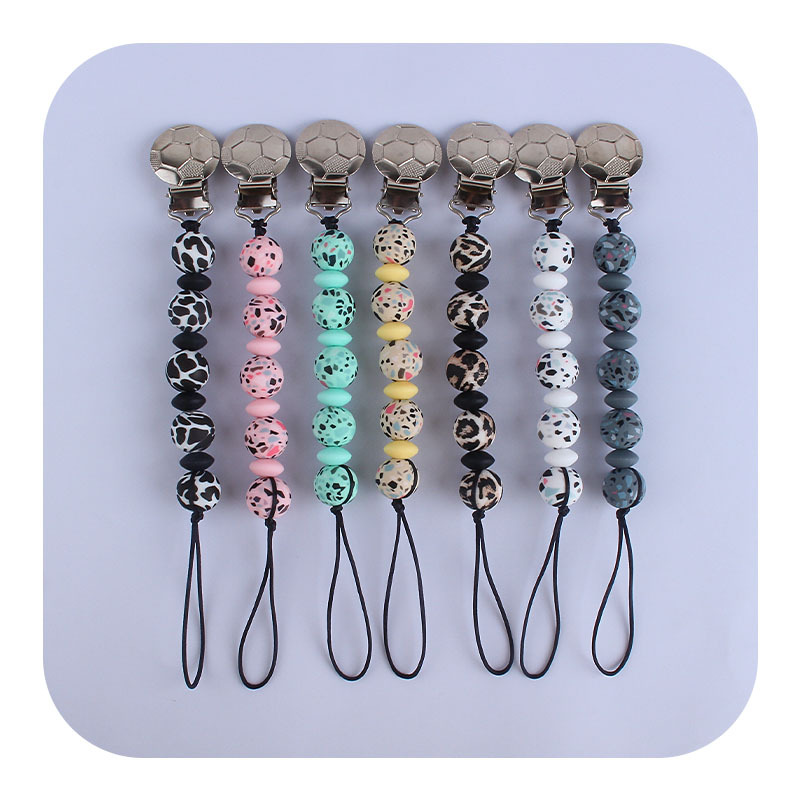 Nuevo bebé hierro fútbol chupete clip bebé creativo calmante leopardo impresión silicona cuentas mordedor chupete cadena anti-gota cadena