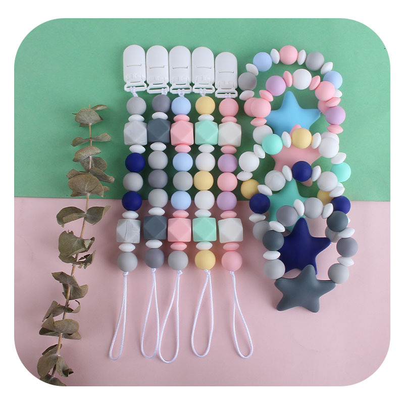Bebé clip de chupete de plástico bebé calmante de silicona estrella de cinco puntas pulsera molar chupete cadena Amazon nuevo