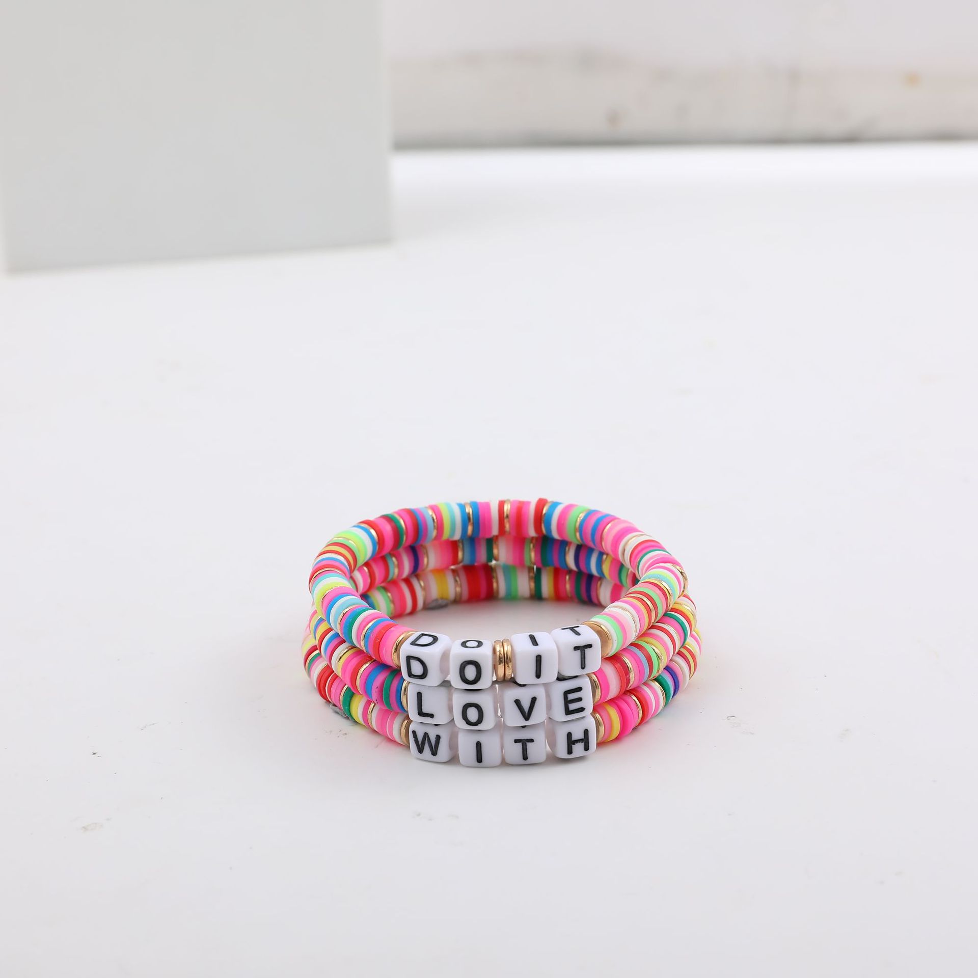 Niche Soft Clay Simple Bohemian Beach Style Letter Bracelet Set Jewelry display picture 5