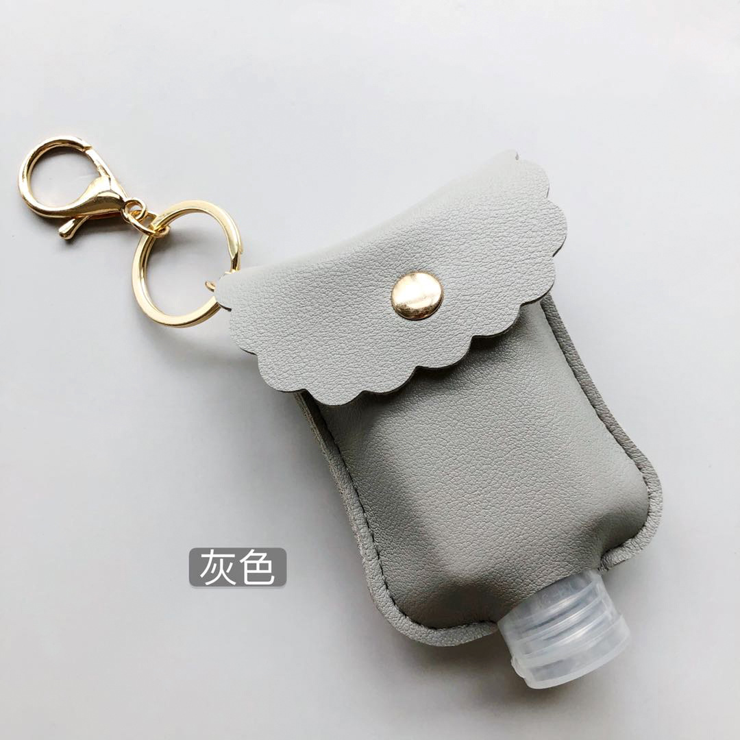 En stock mano desinfectante libre botella de cuero caso estudiante mochila desinfectante llavero colgante de cuero caso 60ml desinfectante de manos botella