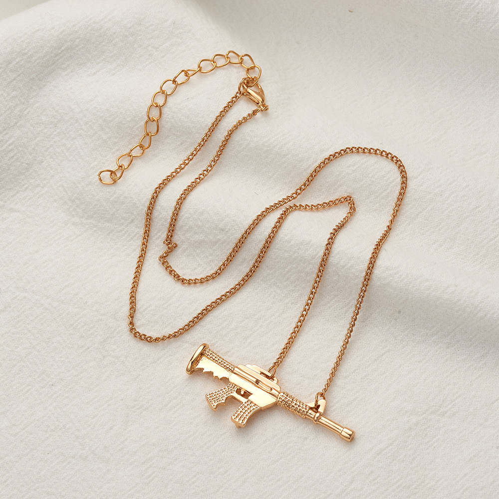 copper pendant machine gun necklace