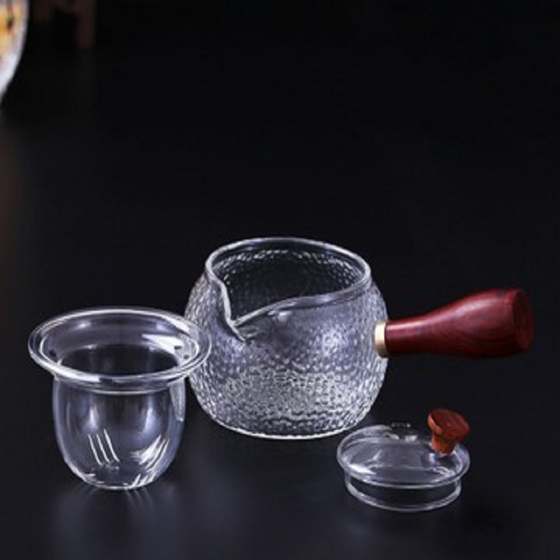 Fábrica al por mayor patrón de martillo mango lateral olla de vidrio resistente al calor tetera de La Flor eléctrica estufa de cerámica calefacción Kung Fu juego de té tetera