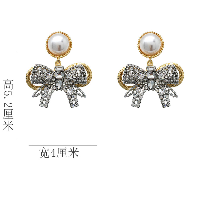 New Baroque Flash Diamond Elegant Pearl Bow 925 Silver Pin Earrings Wholesale display picture 1