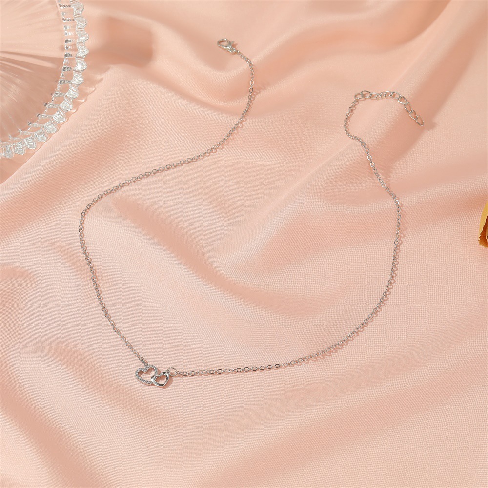 New Ladies Wild Love-shaped Diamond Hollow Double Peach Heart Pendant Necklace Clavicle Chain display picture 7