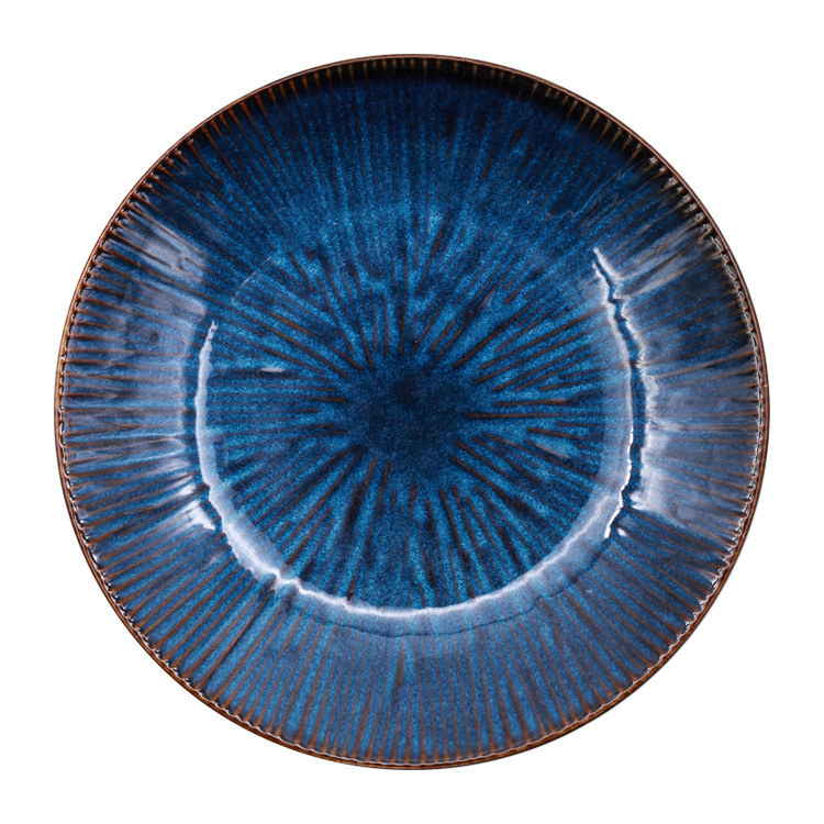 El horno de estilo japonés se convierte en cerámica creativa, plato occidental, plato de carne, plato de verduras, plato de forma especial, fabricante de vajilla para el hogar del hotel al por mayor