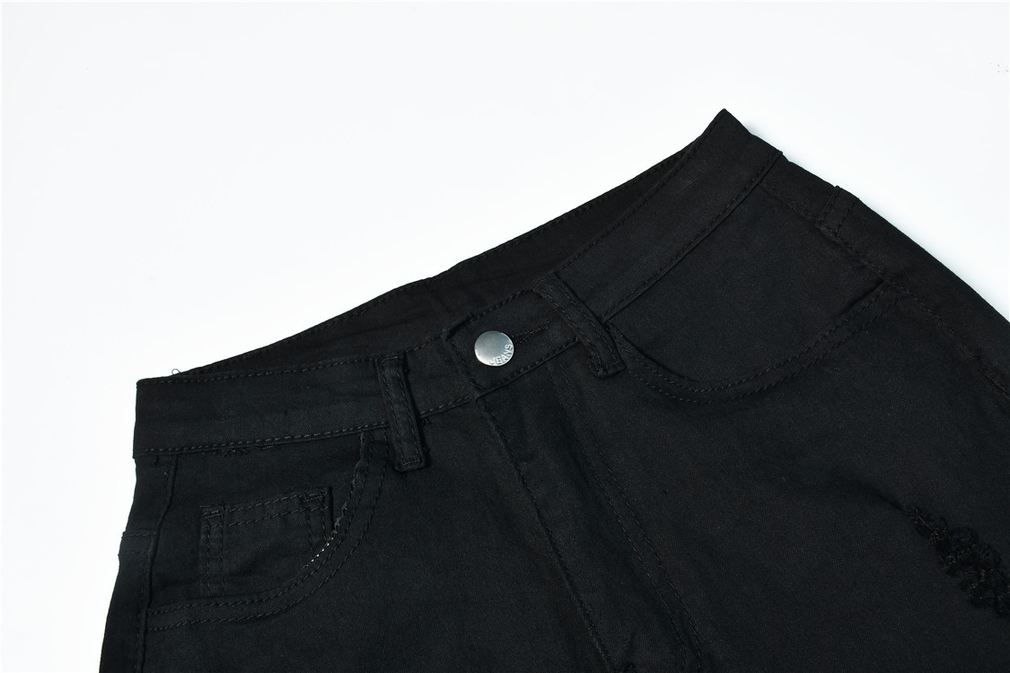 pantalones vaqueros de cintura alta con agujeros elásticos nihaostyle al por mayor NSWL68432