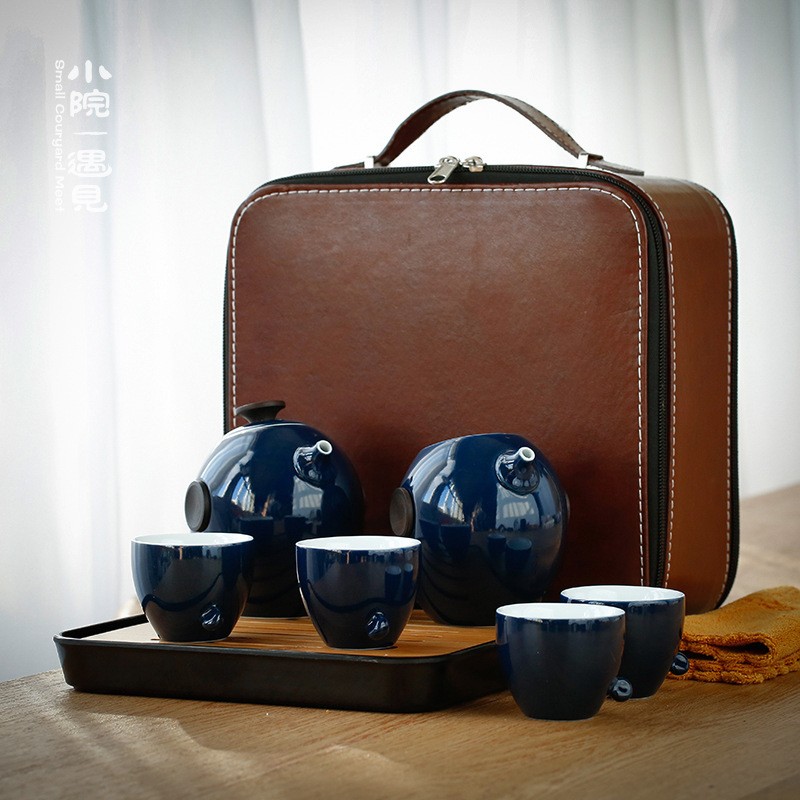 Horno Ding hecho a mano una olla cuatro tazas juego de té caja de regalo viaje azul bolsa portátil simple Kung Fu juego de té traje