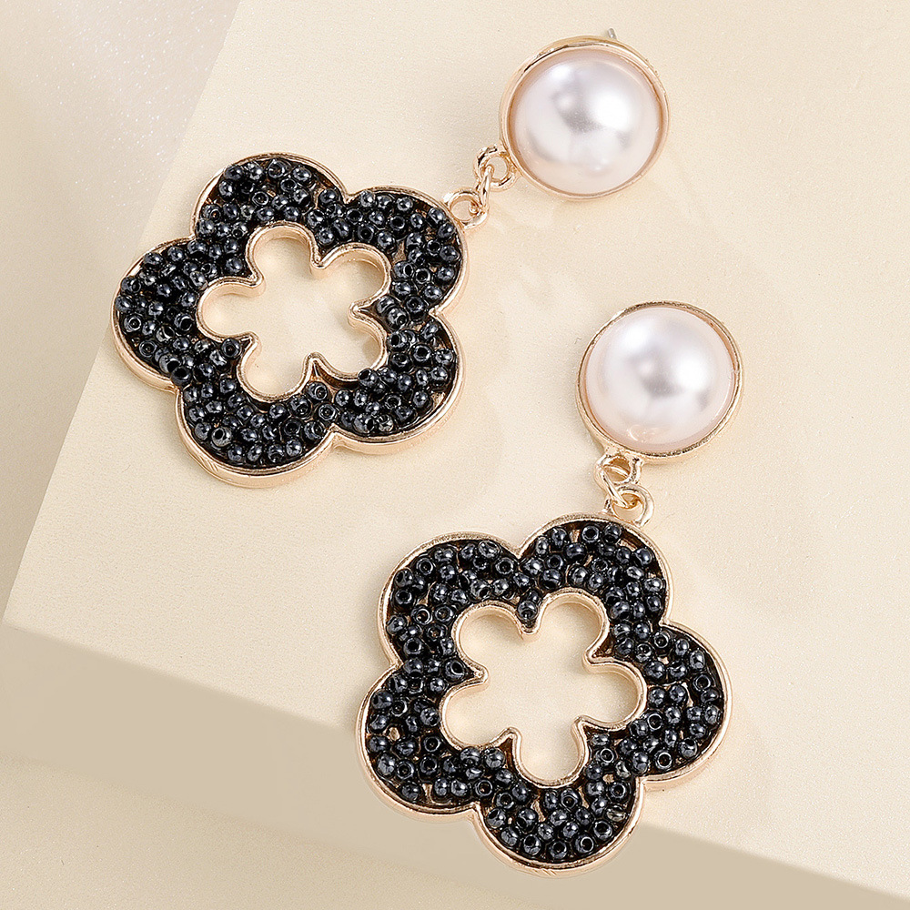 Fashion Wild Flower Earrings Boho Color Rice Beads Geometric Hollow Flower Earrings Wholesale Nihaojewelry display picture 7