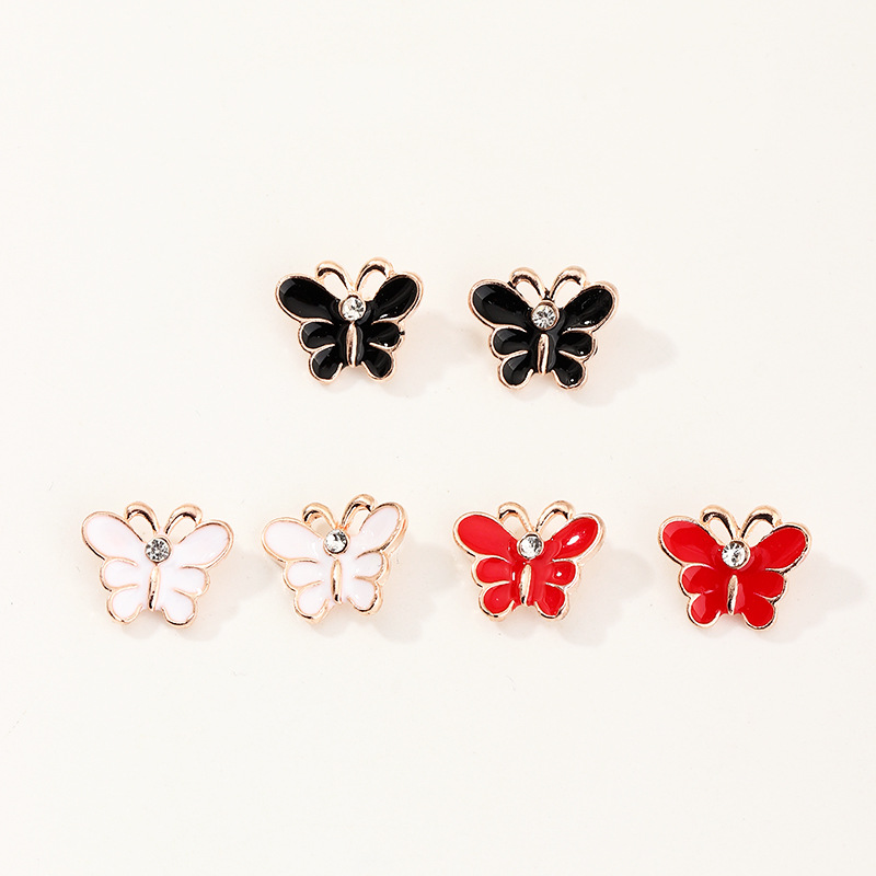 Korean Oil Drop Cartoon Butterfly Cute Pearl All-match Earrings Wholesale display picture 3