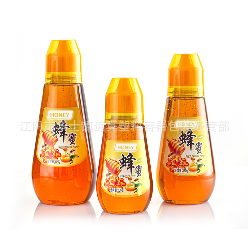 F40140蜂蜜塑料瓶250克PET塑料圆瓶尖嘴包装食品透明塑料罐糖浆瓶