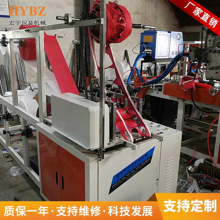 KN95口罩机打片机 内置鼻梁条自动对折封边 做KN95口罩的机器设备