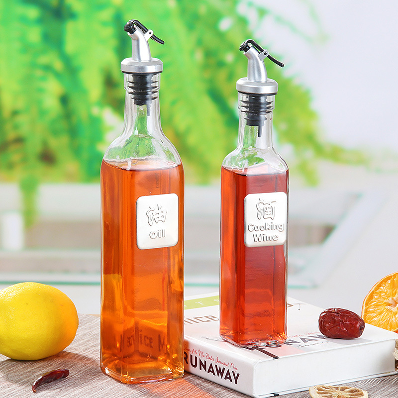 Fábrica al por mayor cocina botella de aceite de vidrio 300ml aceite de oliva olla boquilla de aceite 500ml salsa de soja vinagre tarro hogar