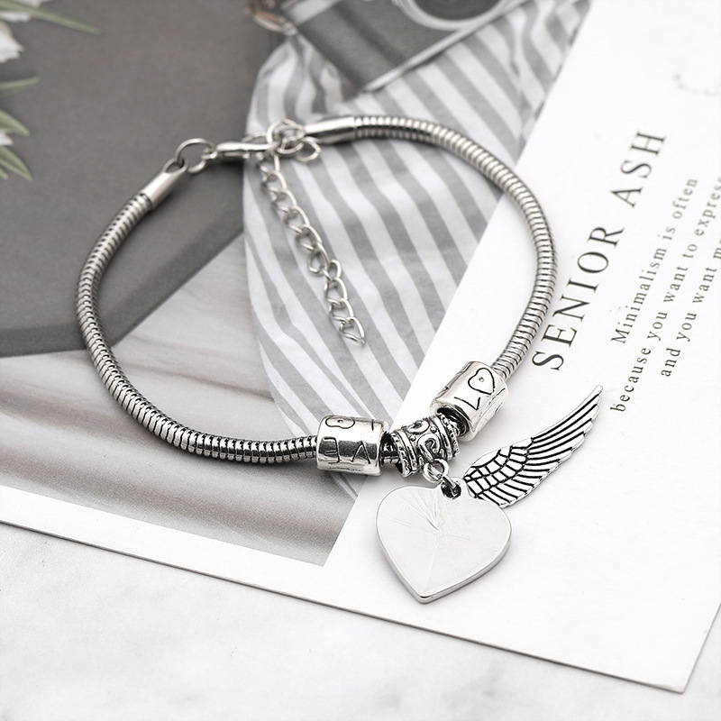 CrossBorder New Arrival Bracelet Necklace Keychain European and American Personalized Creative Heart Wings Necklace Keychain Bracelet Jewelrypicture9