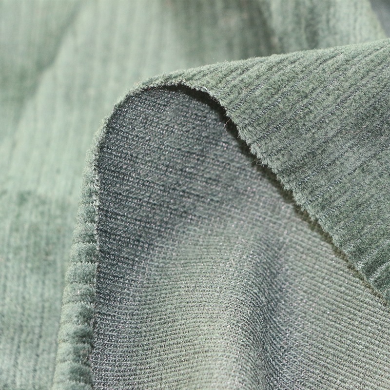 针织纬编4x2弹力坑条灯芯绒棉涤CVC氨纶竖抽条天鹅绒夹克裤子面料