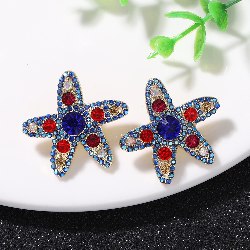 Pendientes Salvajes De Diamantes De Color De Estrella De Mar Personalizados De Moda Súper Flash De Cinco Puntas En Forma De Estrella Lindos Pendientes De Temperamento Japonés Y Coreano Al Por Mayor display picture 10