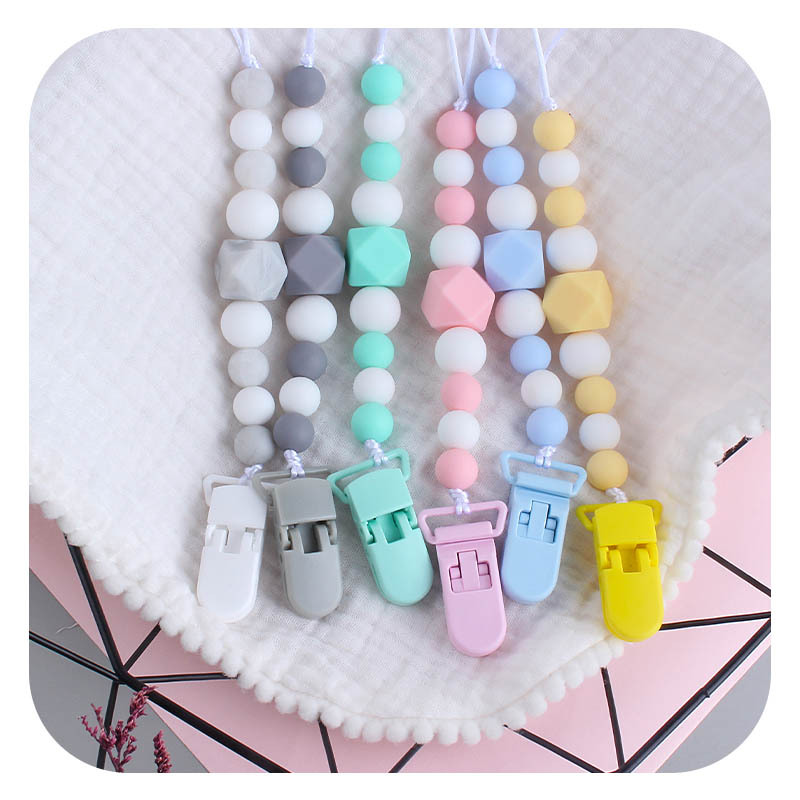 Nuevo clip de pico de pato de plástico grande octogonal de silicona mordedor bebé molar juguete calmante Cadena de chupete de silicona cadena anti-caída