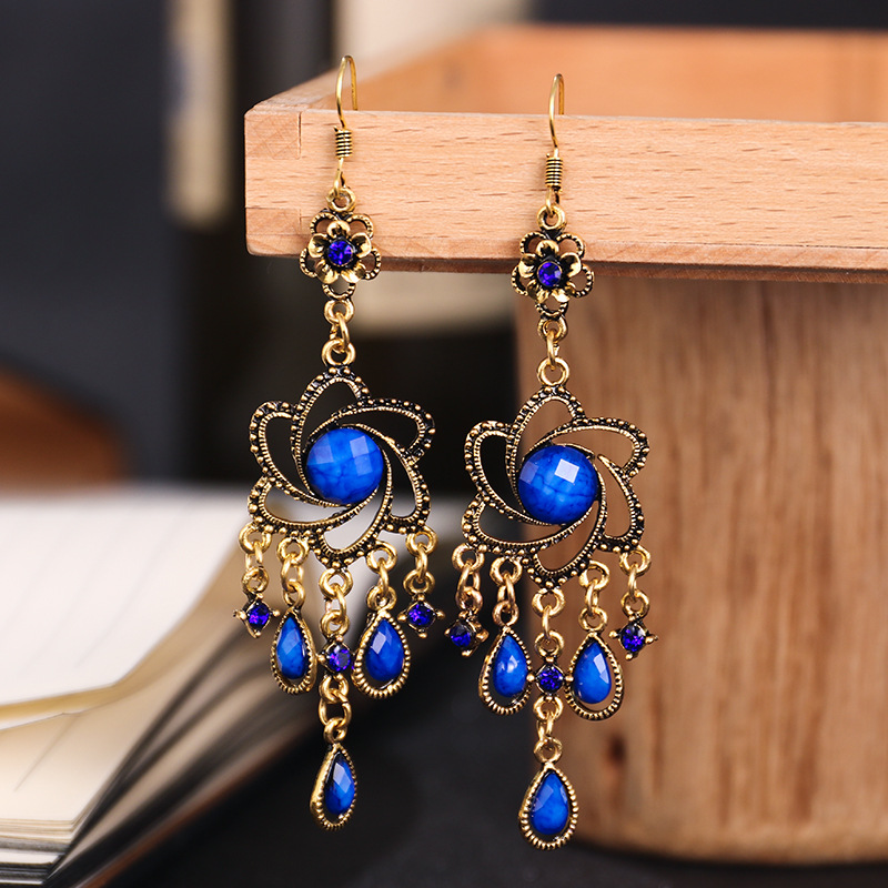 Creative Small Hollow Flower Ethnic Retro Drop Earrings Wholesale display picture 3