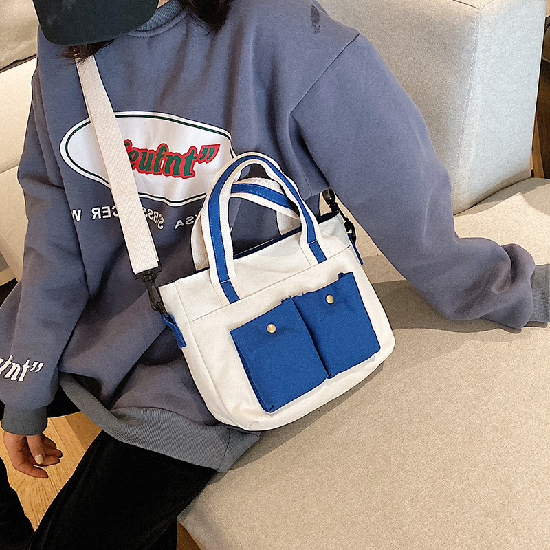 2020 New Korean chic canvas handbag Like a breath of fresh air Color matching Soft sister The single shoulder bag student Messenger Small bag
