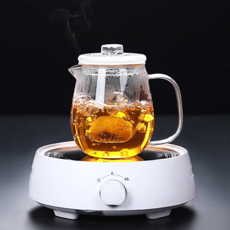 Fábrica al por mayor de vidrio de borosilicato pingüino olla flor tetera engrosada tetera de filtro resistente a altas temperaturas tetera doméstica