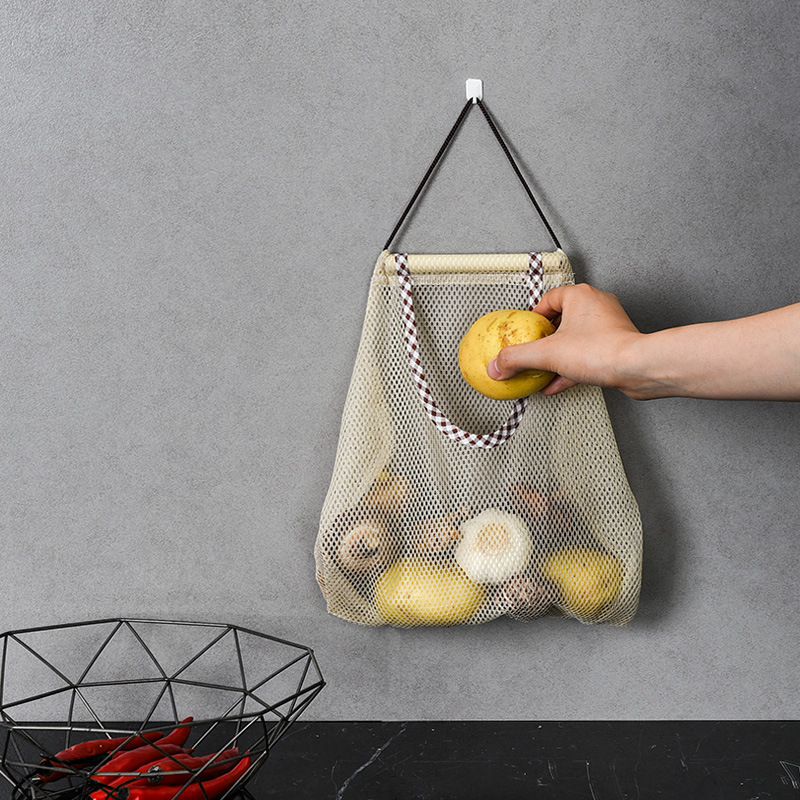 Kitchen vegetable storage net bag trapezoidal multi-purpose creative fruit wall-mounted bag, hanging onion garlic storage bag