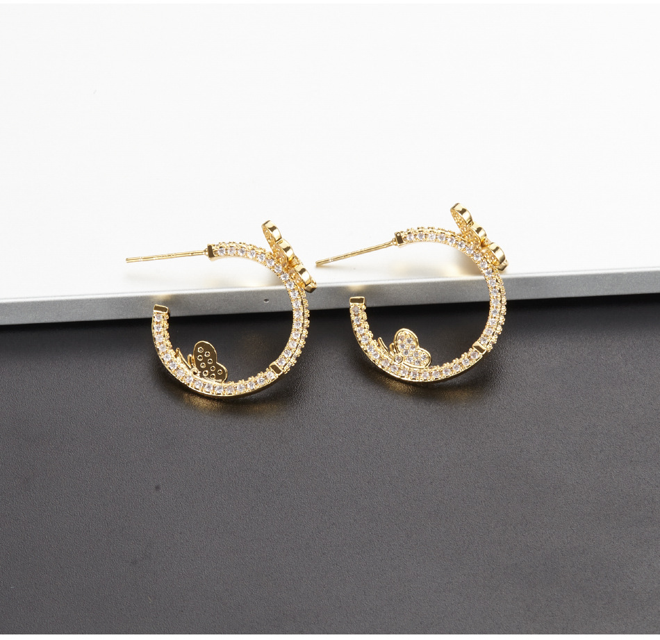 Wholesale Jewelry Butterfly C-shaped Micro-inlaid Zircon Earrings Nihaojewelry display picture 3