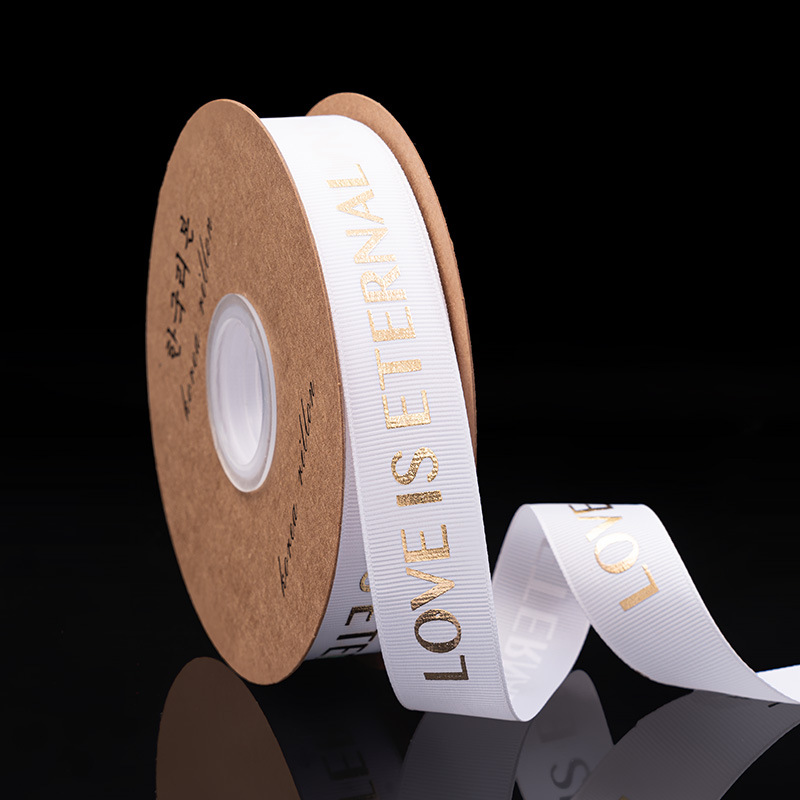 2,5 cm dorado cinta tienda de flores material de DIY floral al por mayor de la flor de poliéster Inglés carta envuelta cinta de la flor