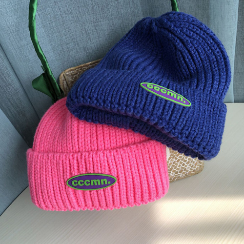 Hat women's letter rubber label autumn and winter versatile woolen hat student couple outdoor warm knitted hat Korean version cold hat for men