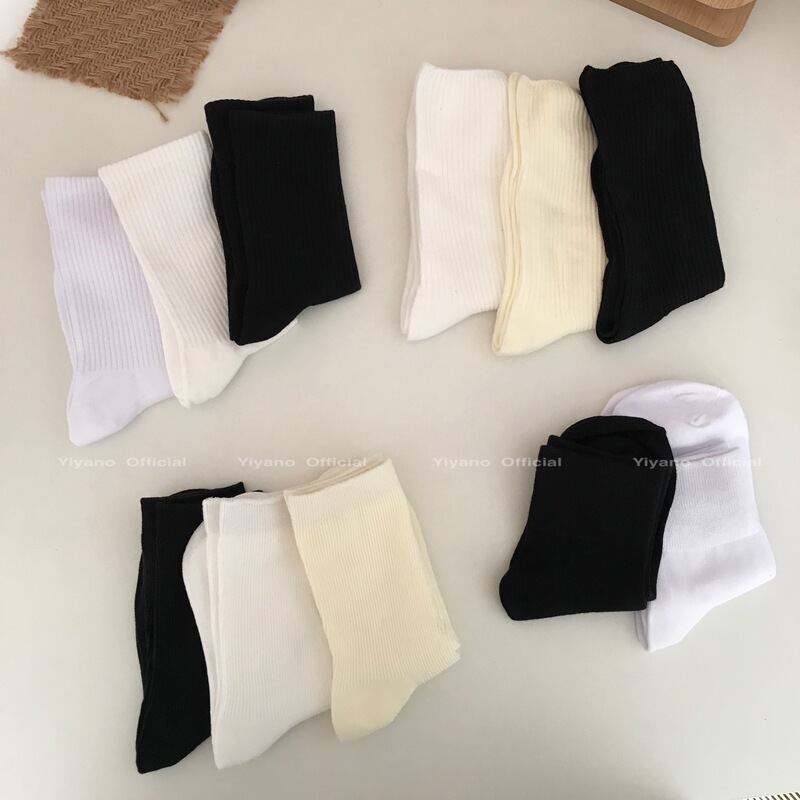 The black and white socks you want are all in this solid color mid-calf length socks for women trendy South Korea ins All-match pile socks vertical stripes