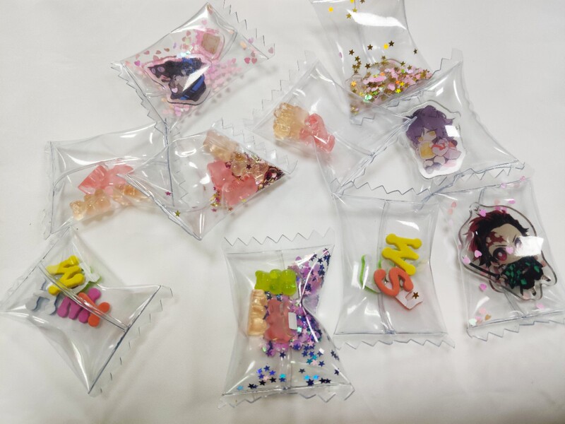 Dongguan factory printable pvc inflatable candy tag pendant acrylic simulation inflatable bear candy air bag