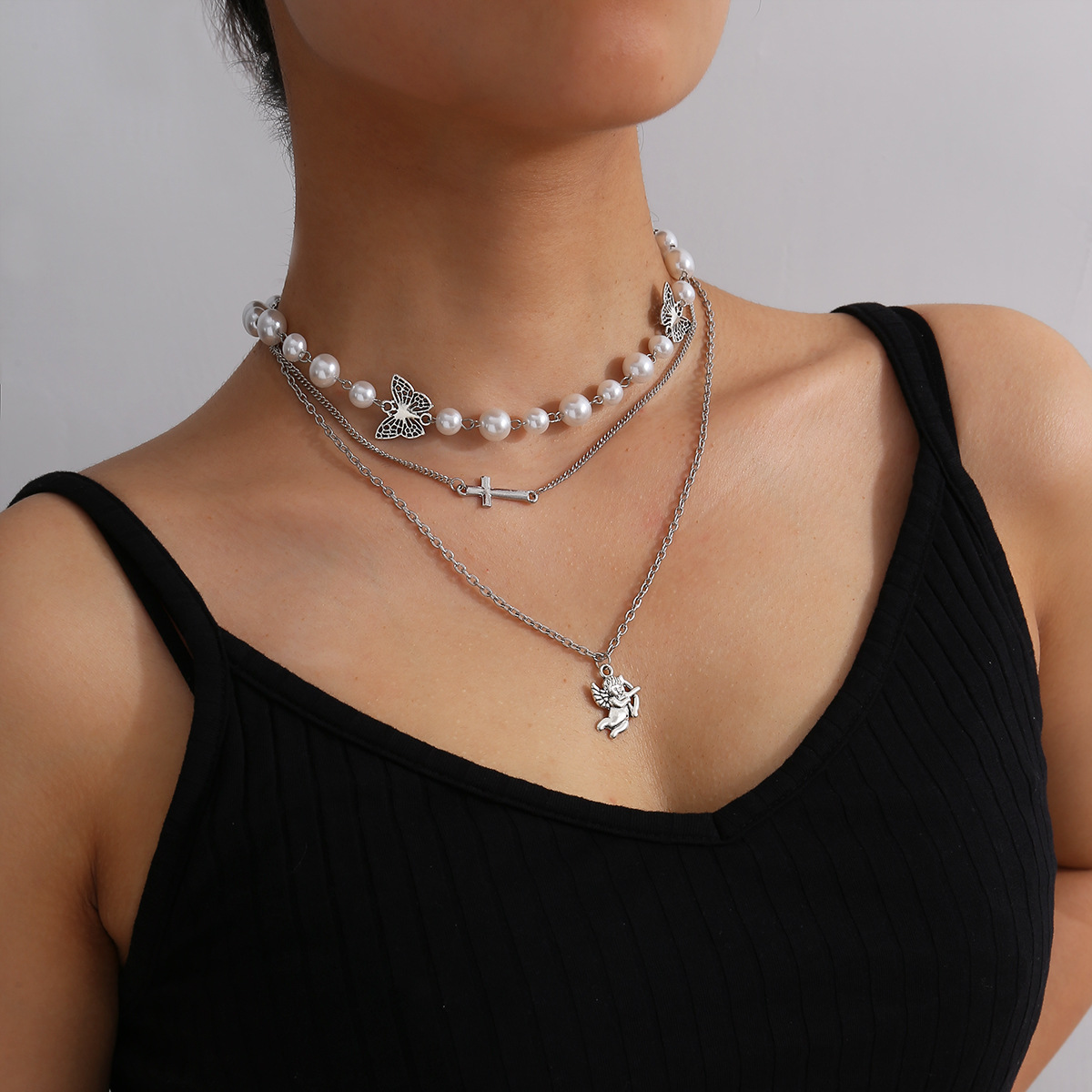 Fashion  Butterfly Pendant Clavicle Necklace Personalized Simple Pearl Cross Necklace display picture 3