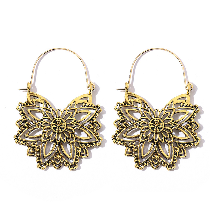 Bohemian Ethnic Carved Rotating Hollow Flowers Retro Earrings Wholesale Nihaojewerly display picture 28